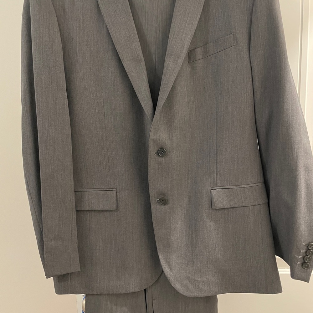 Men’s Warehouse Egara brand, two-piece gray suit, like new.